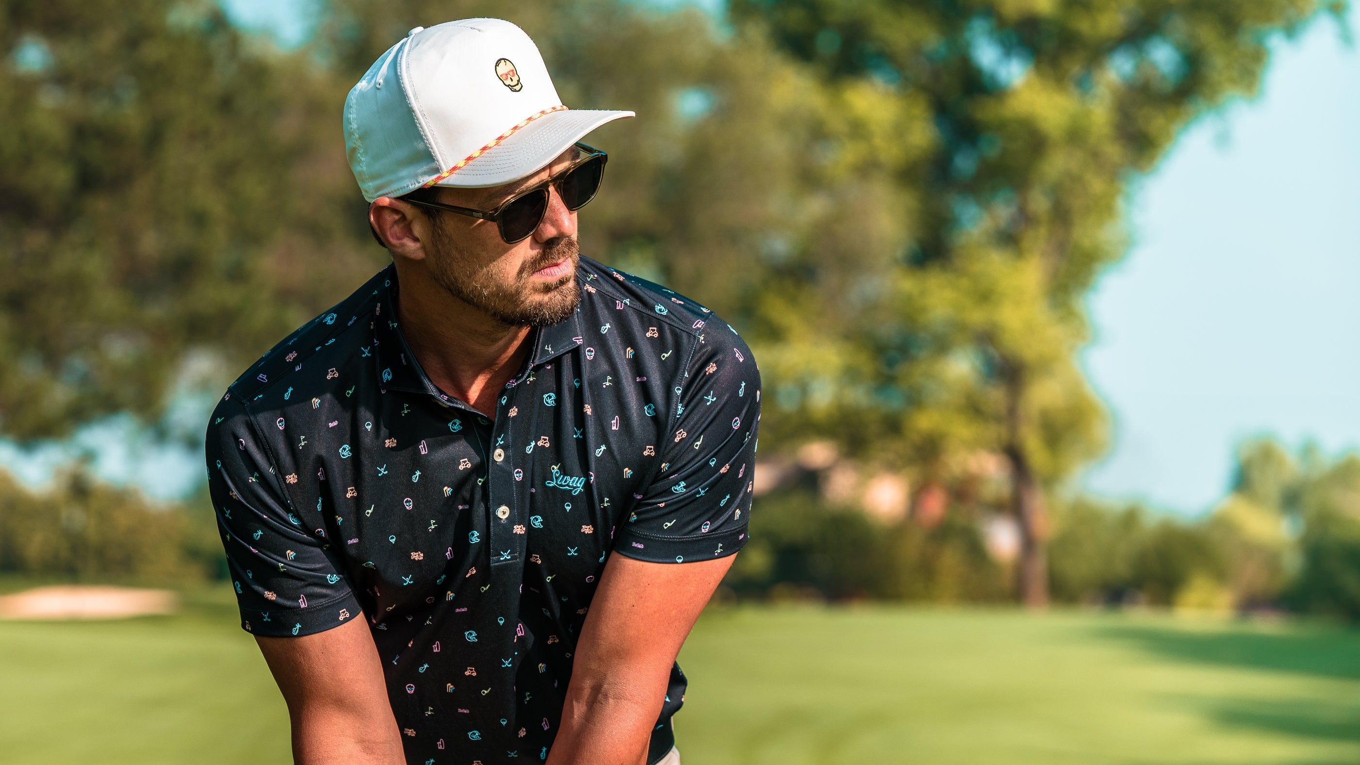 Johnnie-O x SWAG Golf collection of performance golf polos and featherweight hoodies.