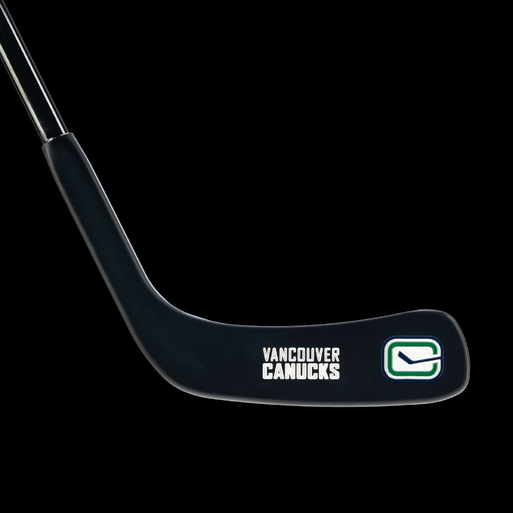 SWAG Golf X Vancouver Canucks hockey stick putter head with Canucks green, blue and white logo.