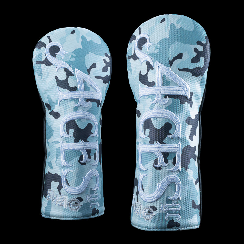 SWAG Golf x 4Aces blue camouflage driver golf club headcover on a black background.