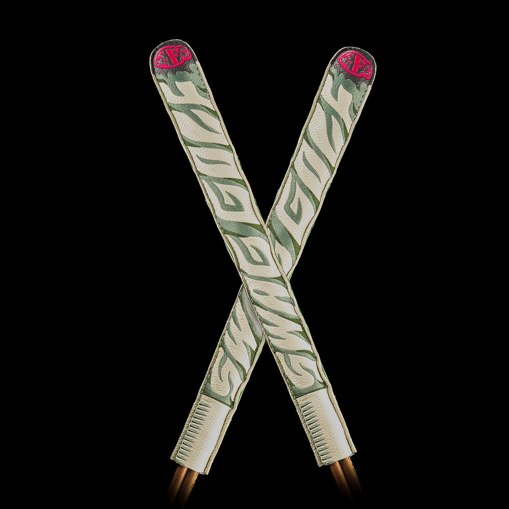 SWAG Golf Jazz Dart Alignment Sticks cover featuring a hand rolled look and lit end.