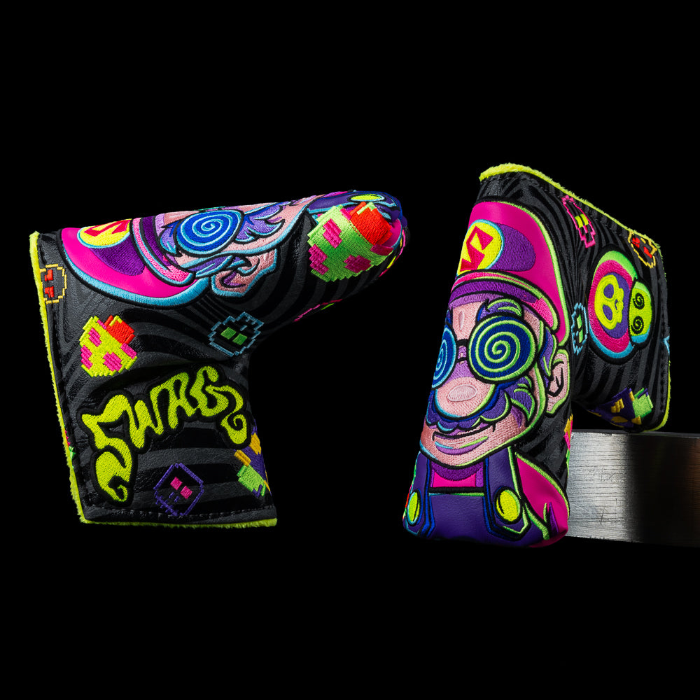 Colorful golf blade headcover with abstract designs on a black background