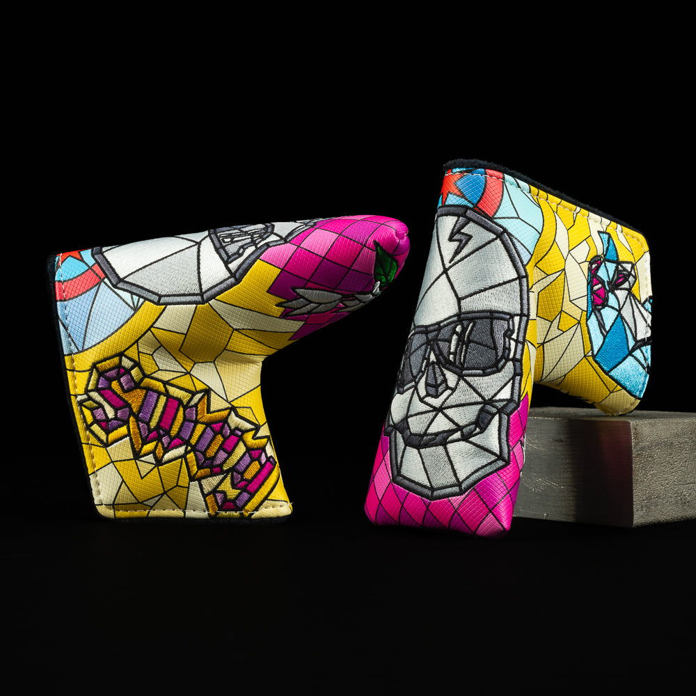 SWAG Golf Church of SWAG yellow, pink, and gray, skull blade golf headcover.