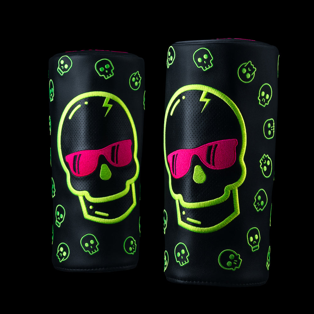 Eclipse Pink & Bolt Skull Barrel Driver Cover with neon green skull and pink sunglasses on black background.