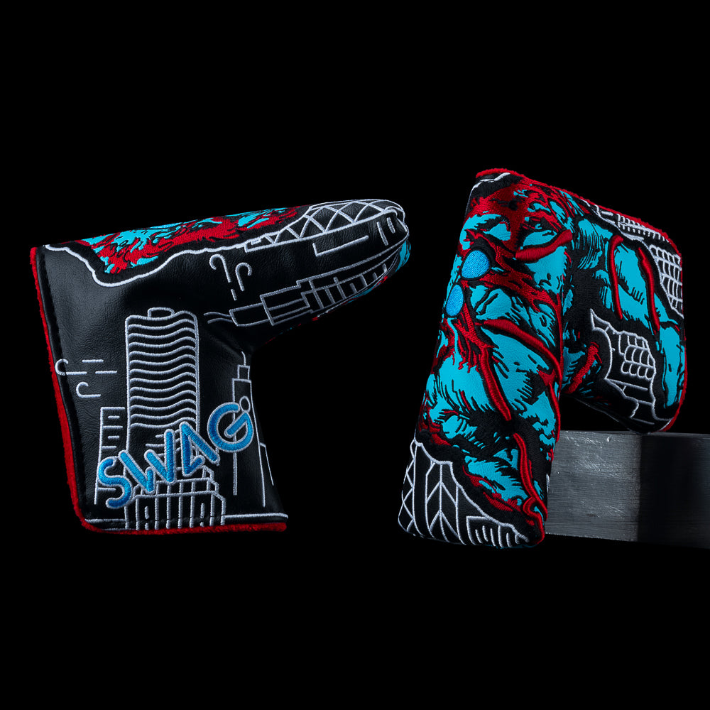 Chicago SWAG Thing blade headcover with monster graphic over Chicago skyline illustration.