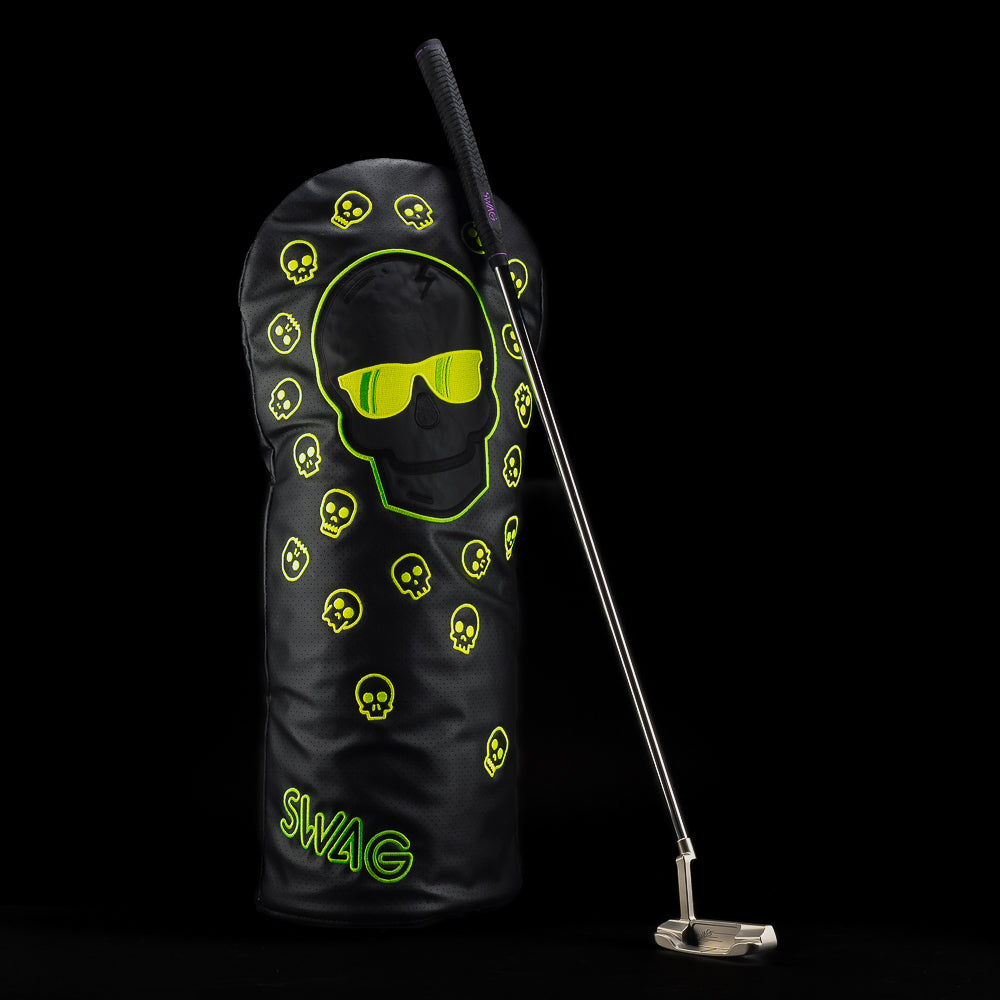 Jumbo driver cover with oversized black skull and neon green accents on black background.
