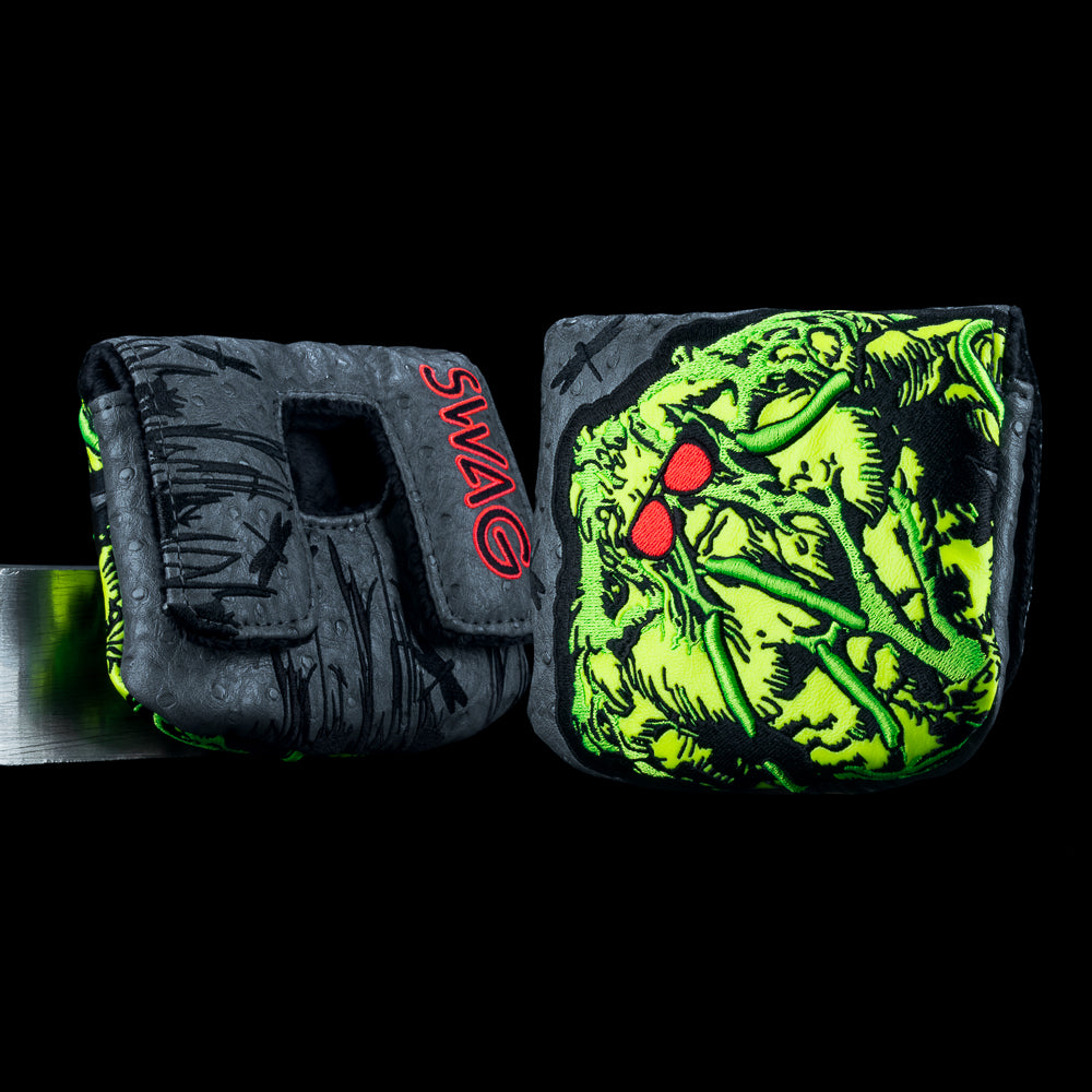 OG SWAG Thing center shaft mallet cover with neon green creature graphic, red glasses, and SWAG branding.