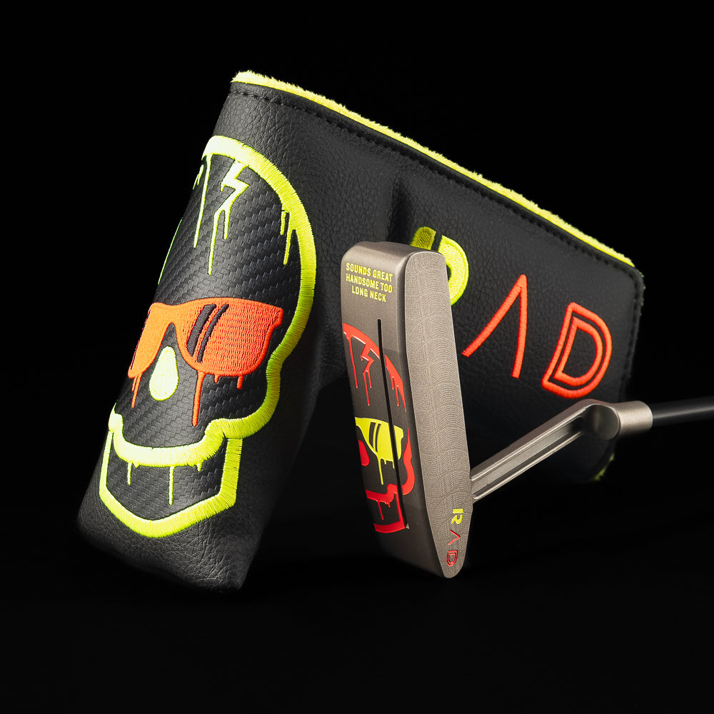 SWAG Golf RAD Handsome Too Longneck limited edition golf putter with a black oxide finish, sound slot, and red and yellow dripping skull design on the sole.