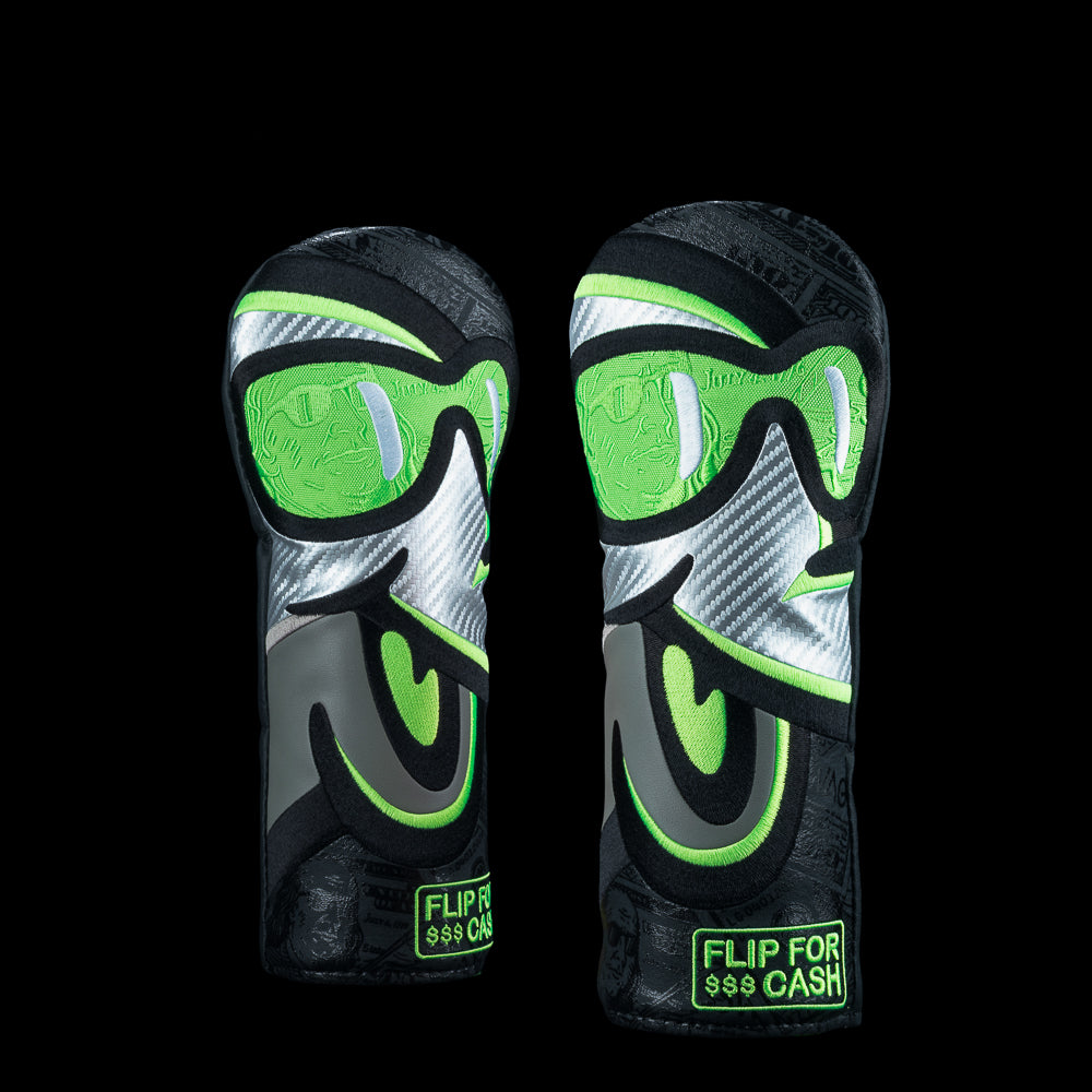 Flip for Cash fairway headcover with green goggles character and dark money pattern background.