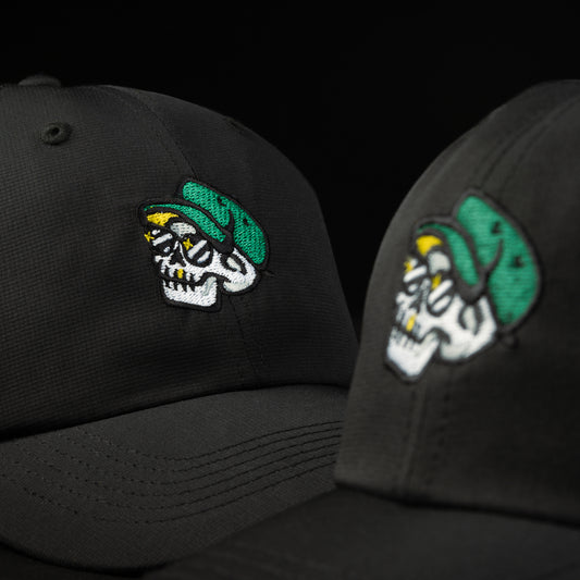 Swag x Imperial Skeleton Caddie Hat in black with green, white and yellow. Swag embroidered in green.