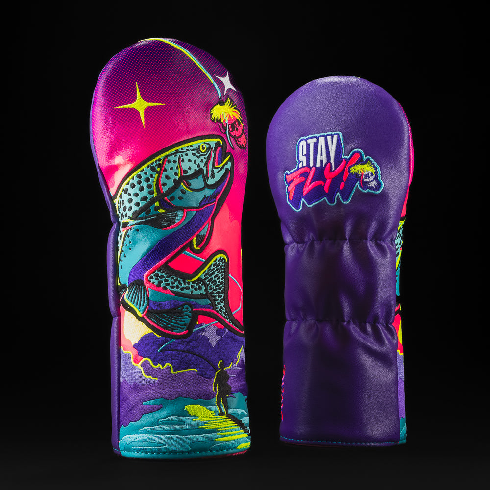 Stay Fly Swagle Box Wood set with a fly fishing scene in blue, pink, purple. And a tackle box fairway headcover with red, white, blue, yellow.