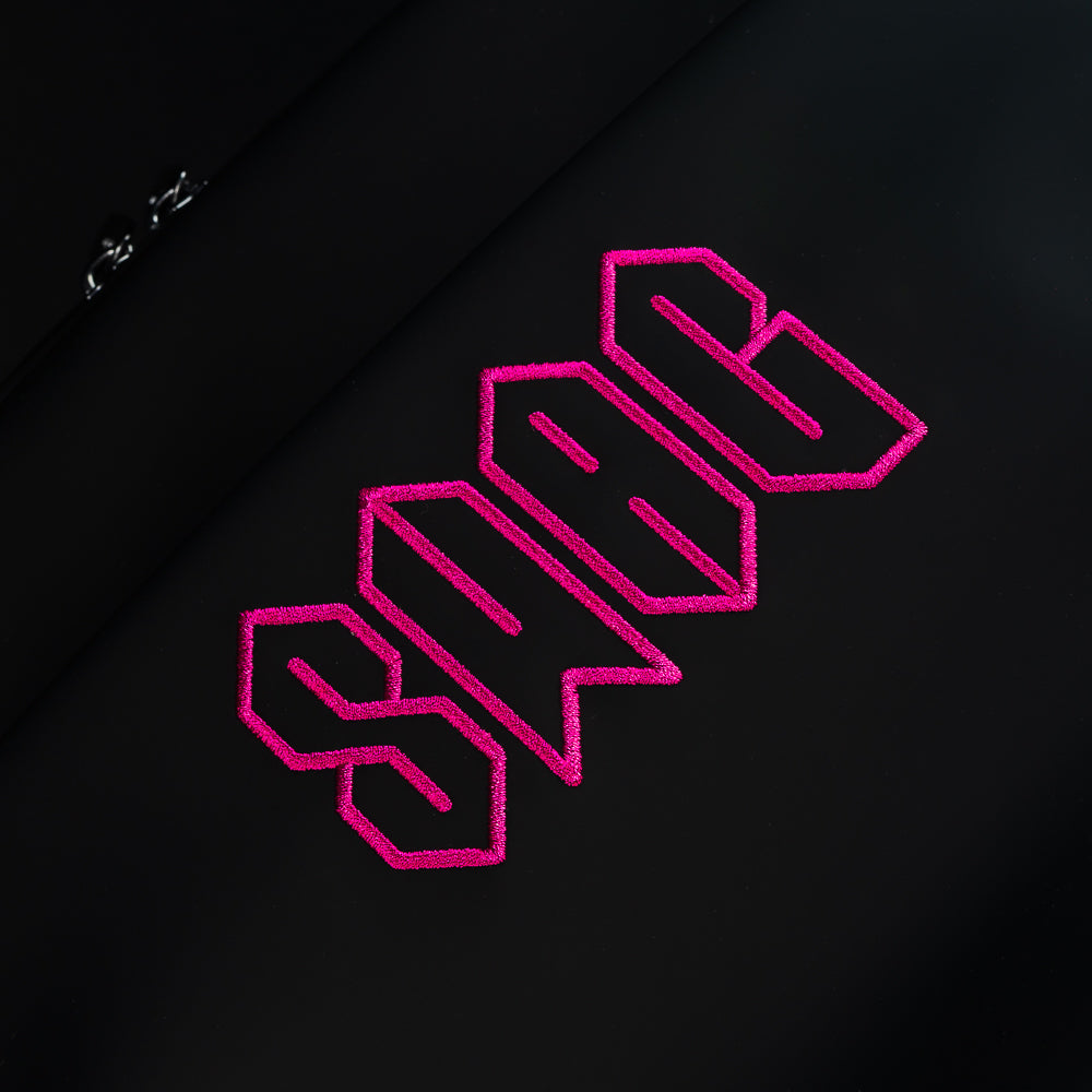 Pink SWAG Golf Logo on backpack.