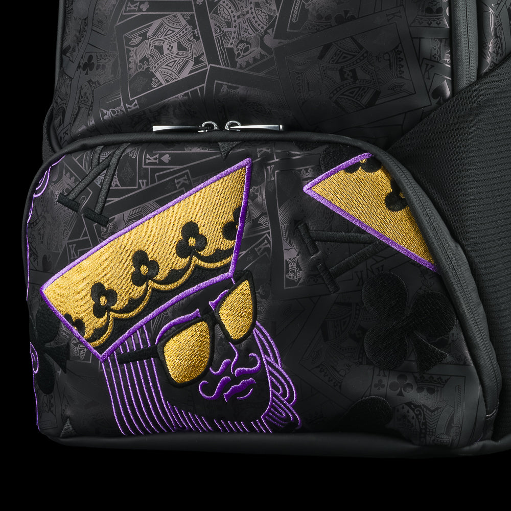 SWAG Golf black backpack with 'SWAG' text and Poker King purple and gold details.
