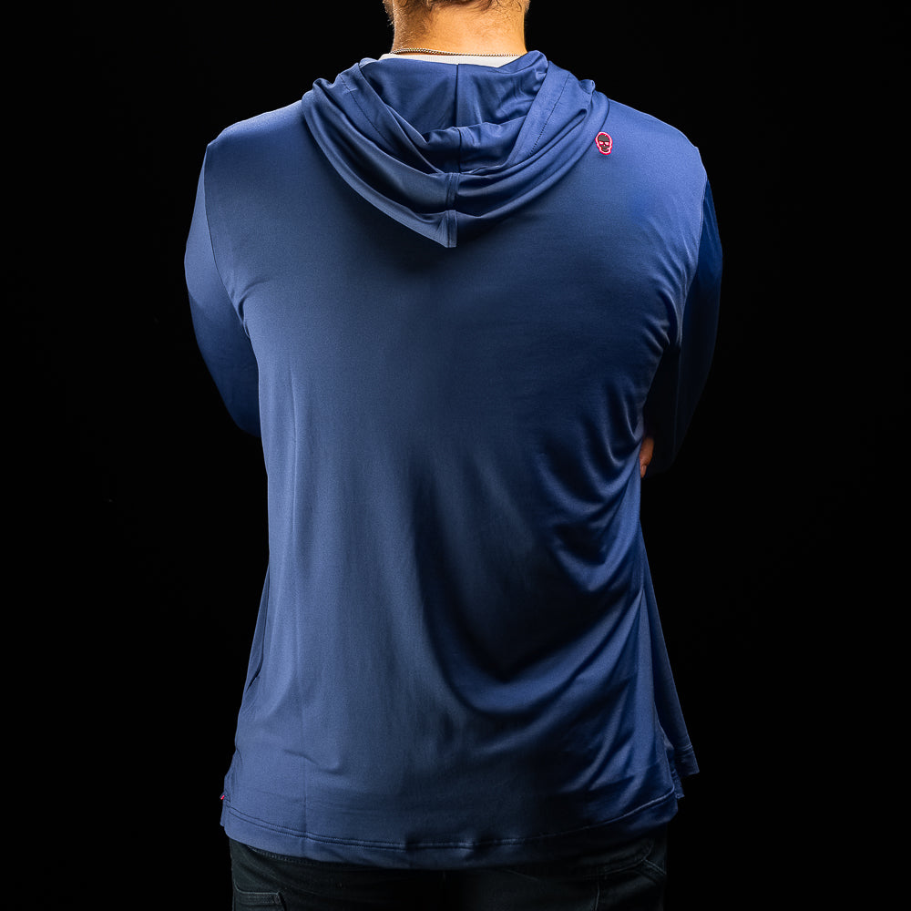 A person viewed from the back wearing a blue hooded athletic top against a black background.