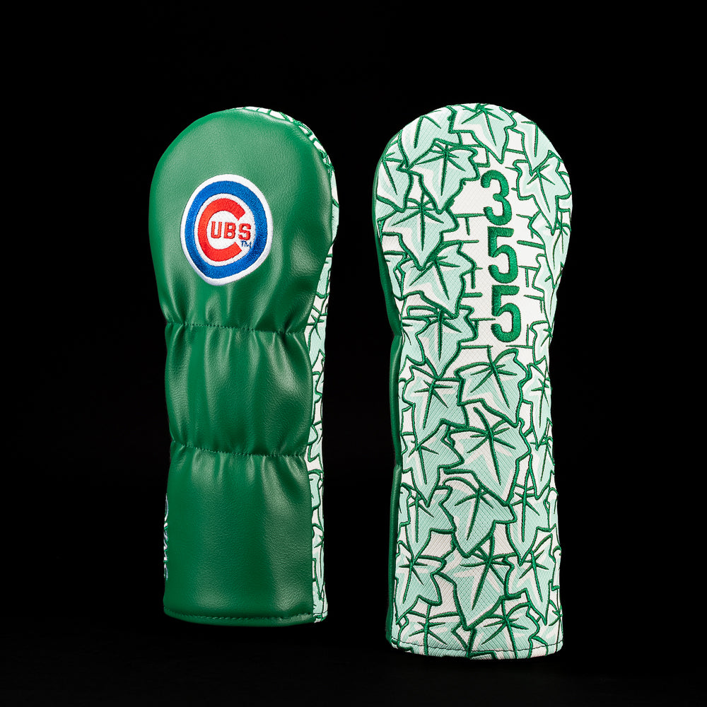 A green and white Chicago Cubs golf club headcover shown from both the front and back against a solid black background. The front features the circular Cubs logo, and the back displays a green geometric pattern with the number 355.