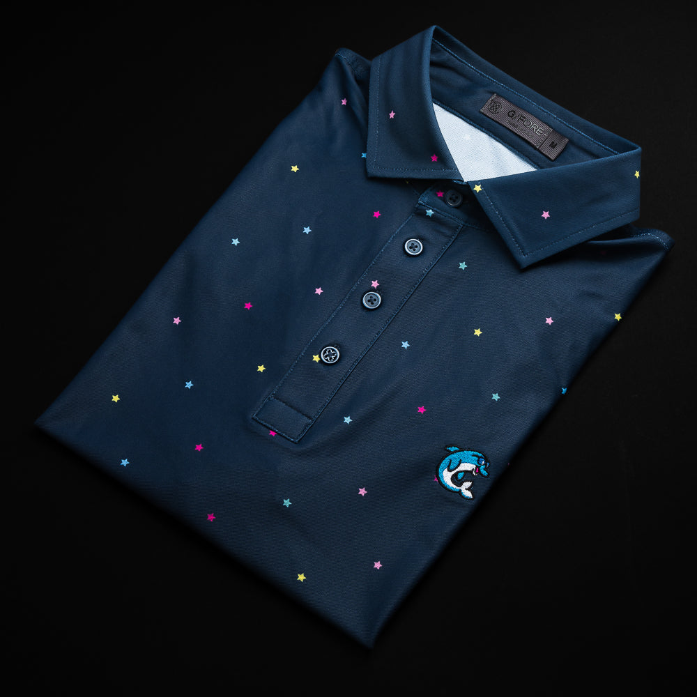 G/Fore x SWAG Golf navy men's short sleeve performance golf polo shirt with stars print and embroidered flipper on left chest.