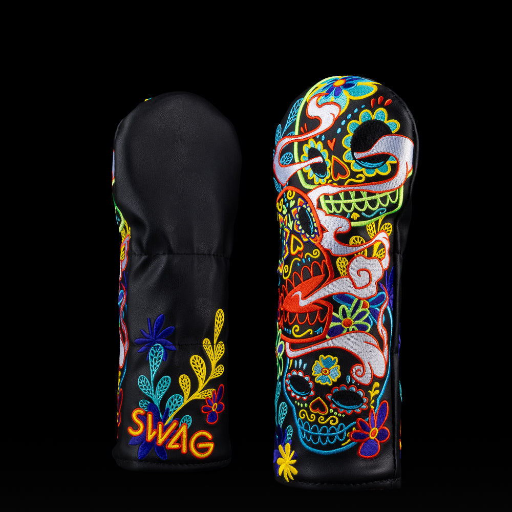 Tres Calaveras fairway headcover with colorful neon sugar skulls, flowers, and SWAG logo on black background.