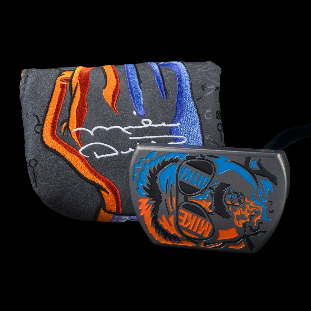 SWAG Golf x Mike Ditka Da Boss 2.0 limited edition black oxide mid-mallet golf putter made in the USA. Featuring Mike smoking a cigar with Chicago Bears orange and blue colors.