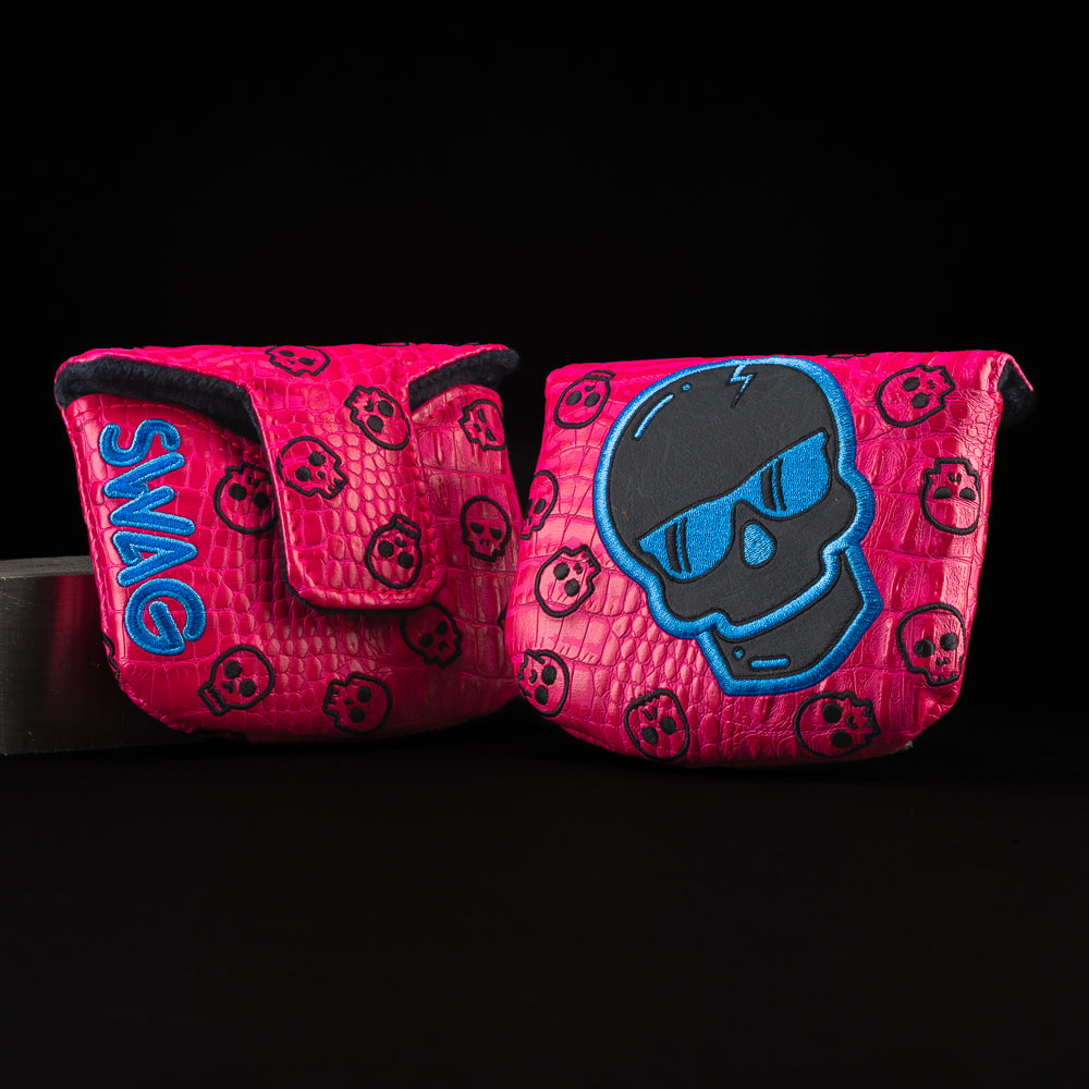 Hot Pink mallet with black and blue skull golf club headcover.
