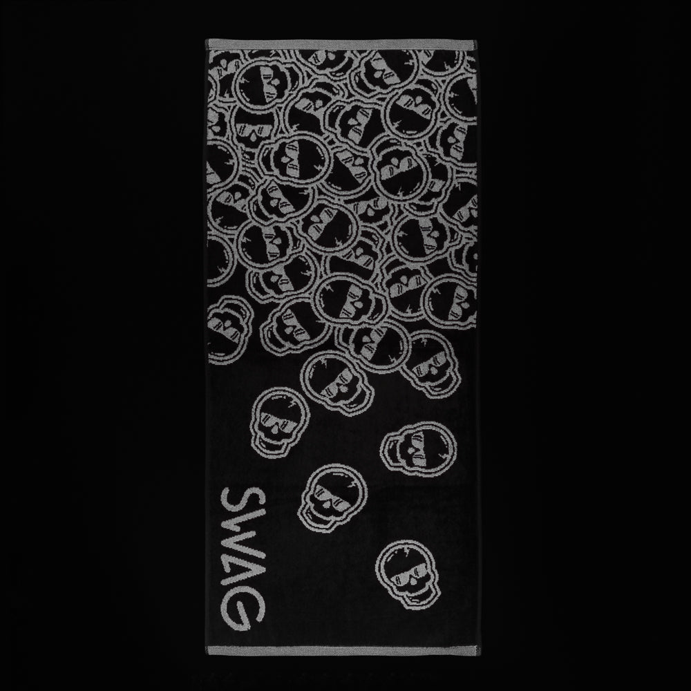 Swag falling skulls gray and black golf towel.