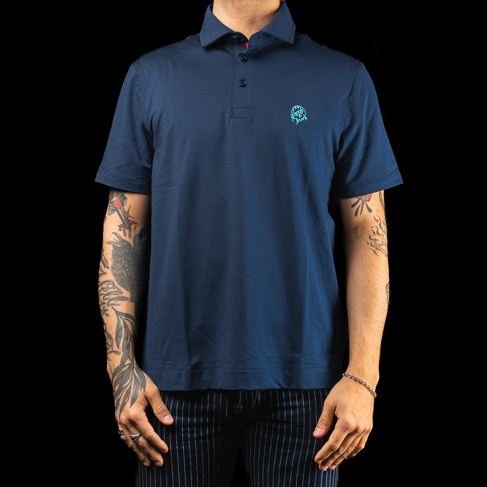 SWAG Golf x G/FORE navy men's golf polo featuring dripping SWAG skull logo over the left chest.