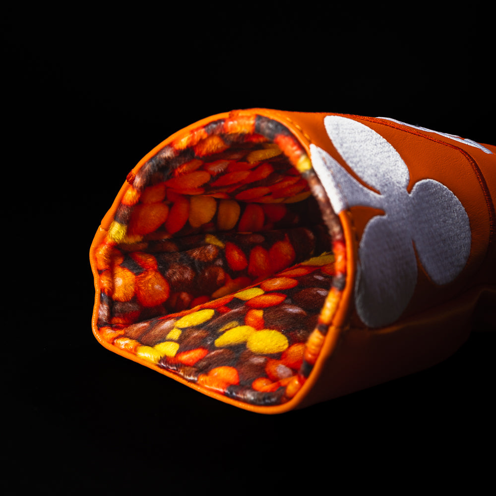 King of Peanut Butter driver headcover in orange, yellow, white and brown.