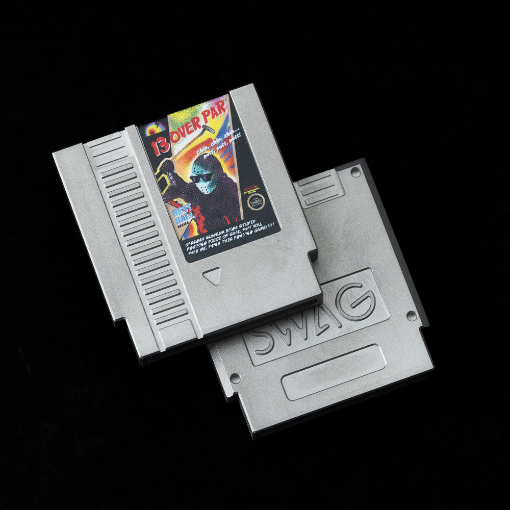 SWAG Golf 13 Over Par mini video game cartridge themed stainless steel golf ball marker accessory.