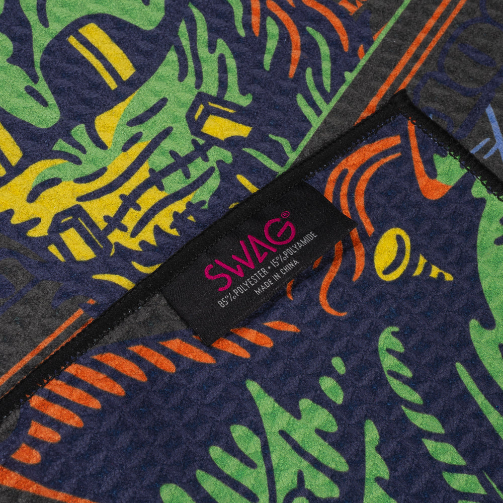 Knit golf towel with neon $100 bill design featuring Ben Franklin-Stein’s Monster in stitched detail.