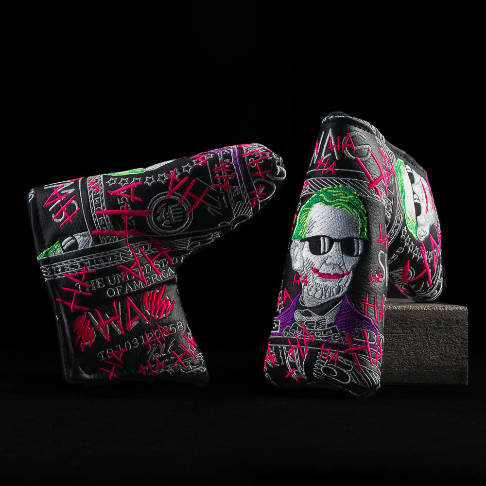 Defaced Lincoln Blade Putter Cover with neon graffiti dollar bill design and green-haired Lincoln art.
