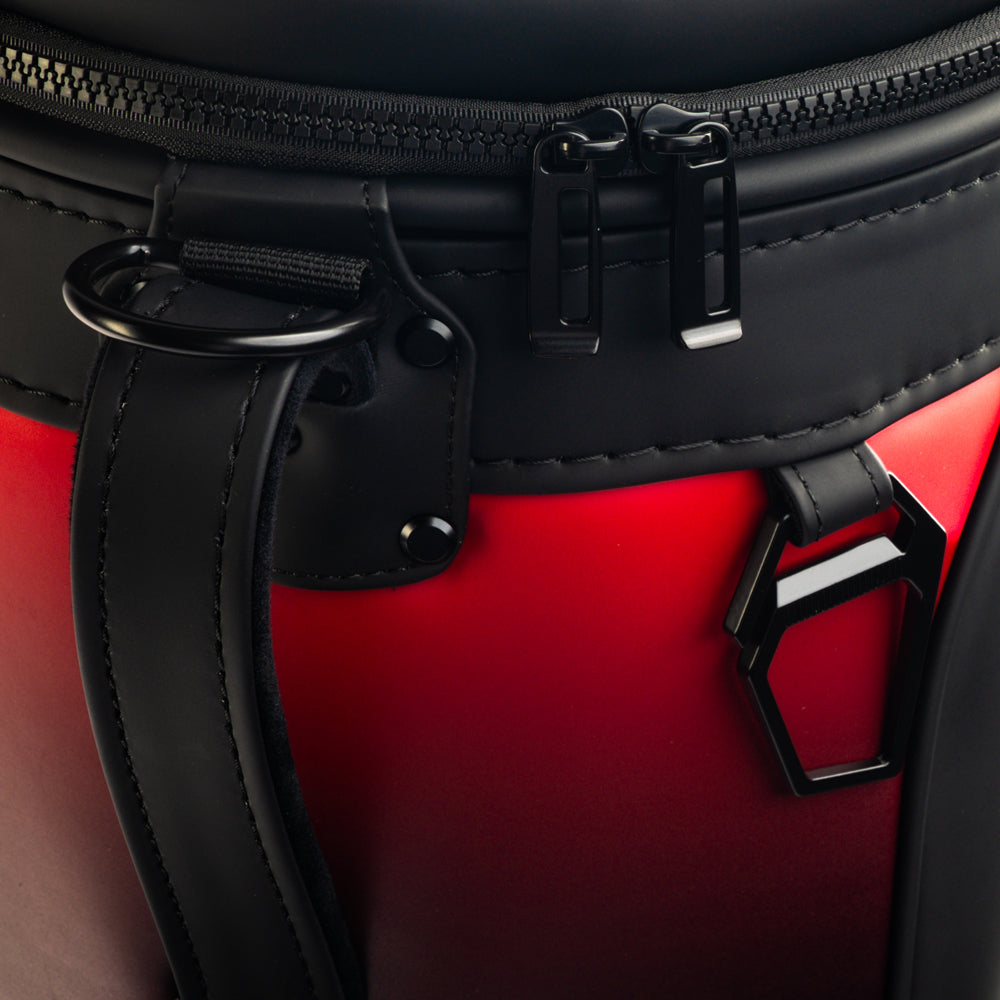 Close-up of the SWAG Golf Atlanta Falcons Den Caddy Cooler featuring premium zipper hardware, reinforced construction, and the red-to-black gradient exterior.