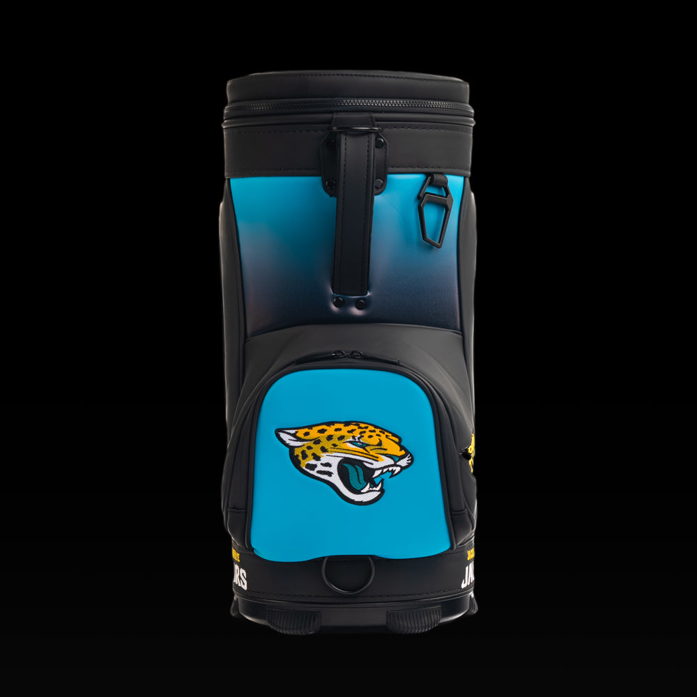 Rear view of the SWAG Golf Jacksonville Jaguars Den Caddy Cooler with teal and black color blocking.