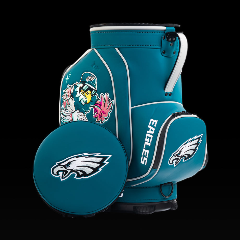 Philadelphia Eagles Den Caddy Cooler displayed with the removable embroidered lid beside the cooler.