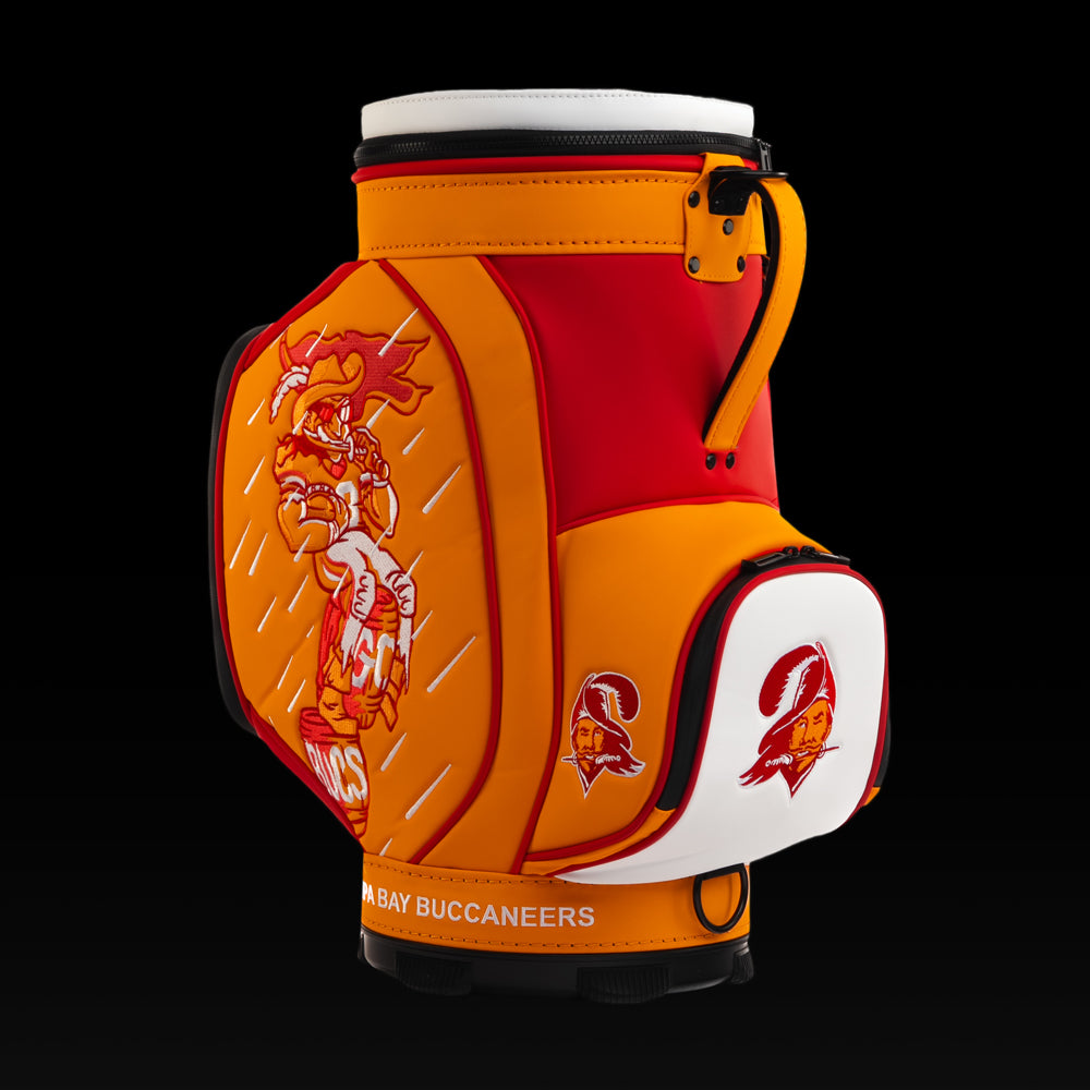 SWAG Golf Tampa Bay Buccaneers Den Caddy Cooler featuring Buccaneers pirate artwork, red and orange graphics, and an embroidered Buccaneers logo pocket.