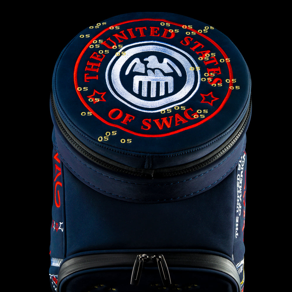 RWB Lincoln Den Caddy insulated cooler blue bag featuring embroidered $5 bill graphics and United States of SWAG emblem.