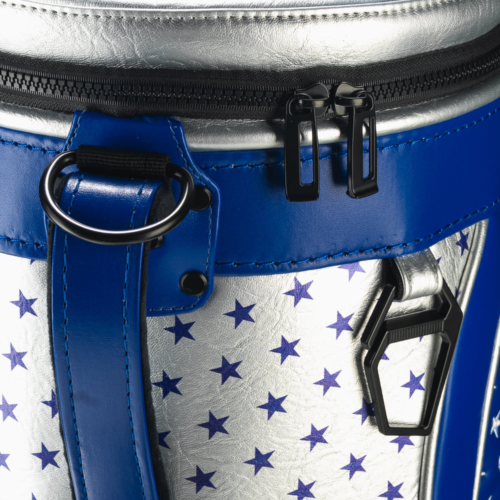 Detailed view of the Fore! Fathers Den Caddy Cooler pocket featuring blue star-patterned fabric, premium zipper hardware, and patriotic design elements.
