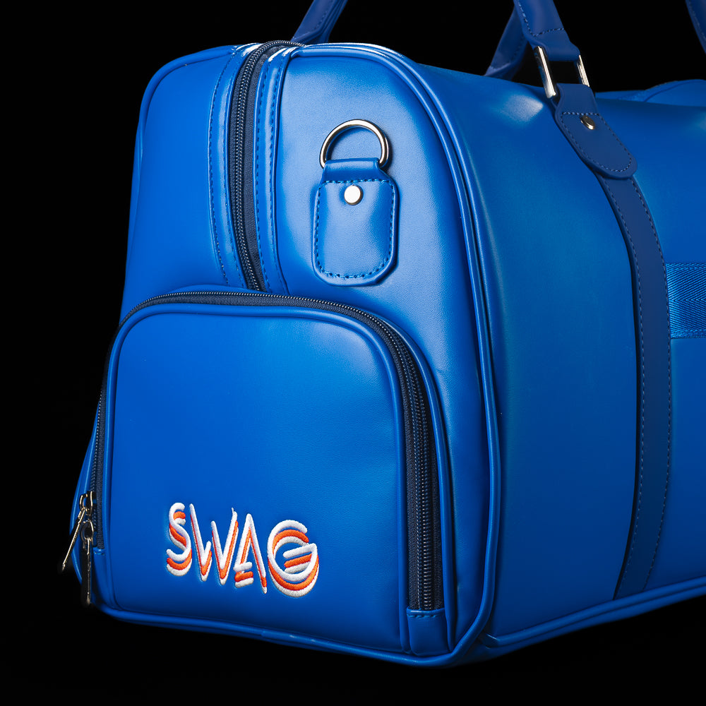 Side pocket detail of the RWB Gigantic Lincoln Duffel Bag featuring embroidered SWAG branding, premium materials, and additional storage space.