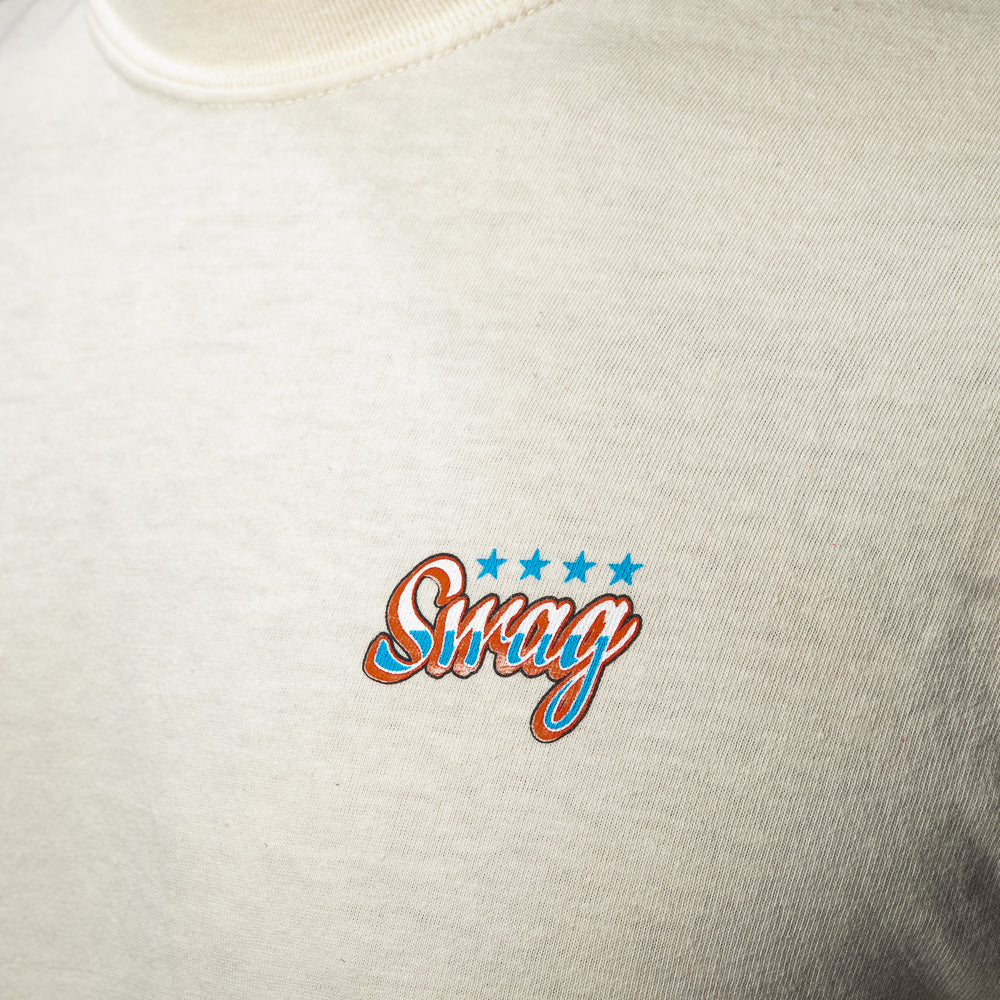 SWAG Golf cream short sleeve graphic t-shirt with Bombshell Pinup graphic.