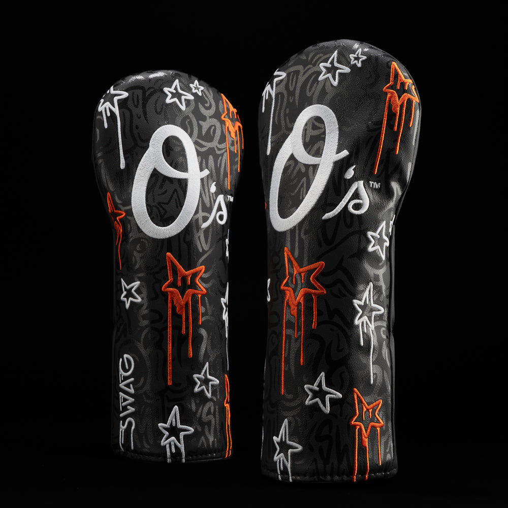 MLB Baltimore Orioles fairway headcover with graffiti artwork including BATTA UP!, TURN 2, and MLB X SWAG with glow in the dark option.
