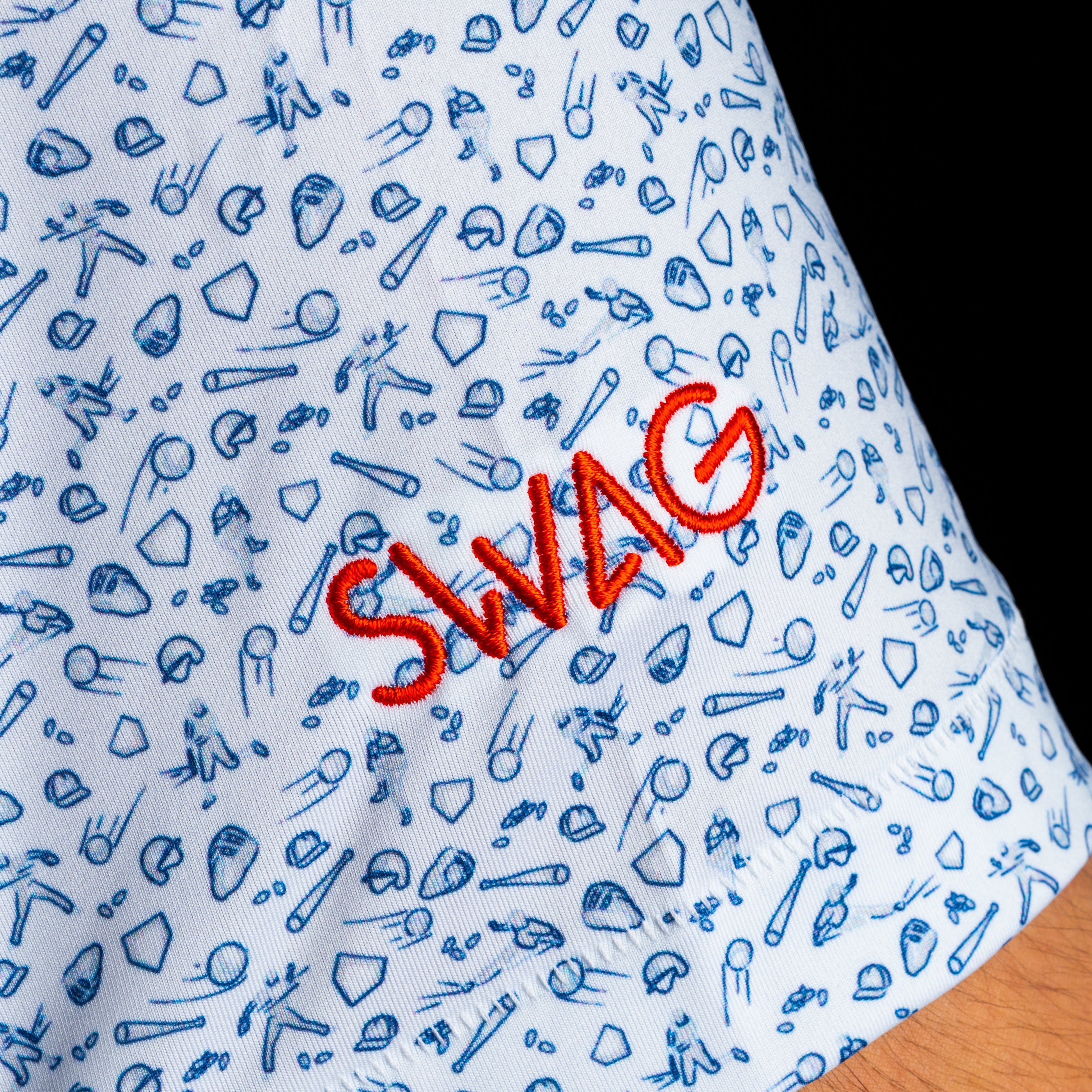 Peter Millar x SWAG polo with embroidered Major SWAG golfer on chest and baseball-themed background print in Summer Comfort fit.