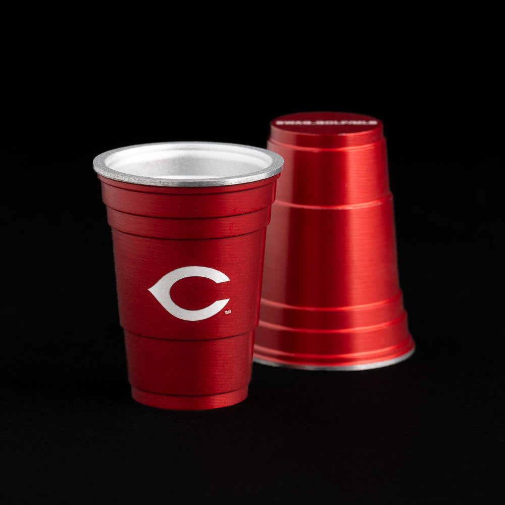 Cincinnati Reds logo flip cup ball marker in red.