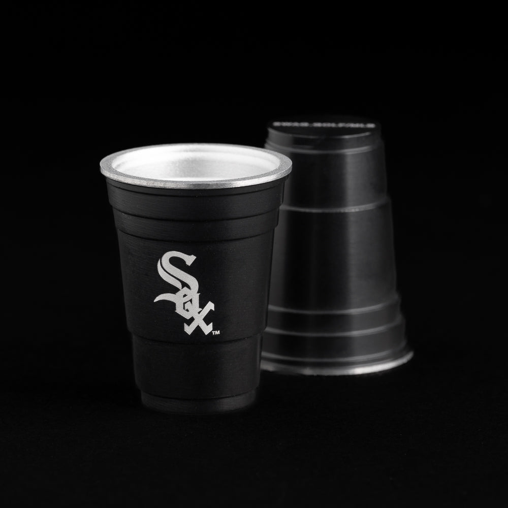 Chicago White Sox logo flip cup ball marker in black.