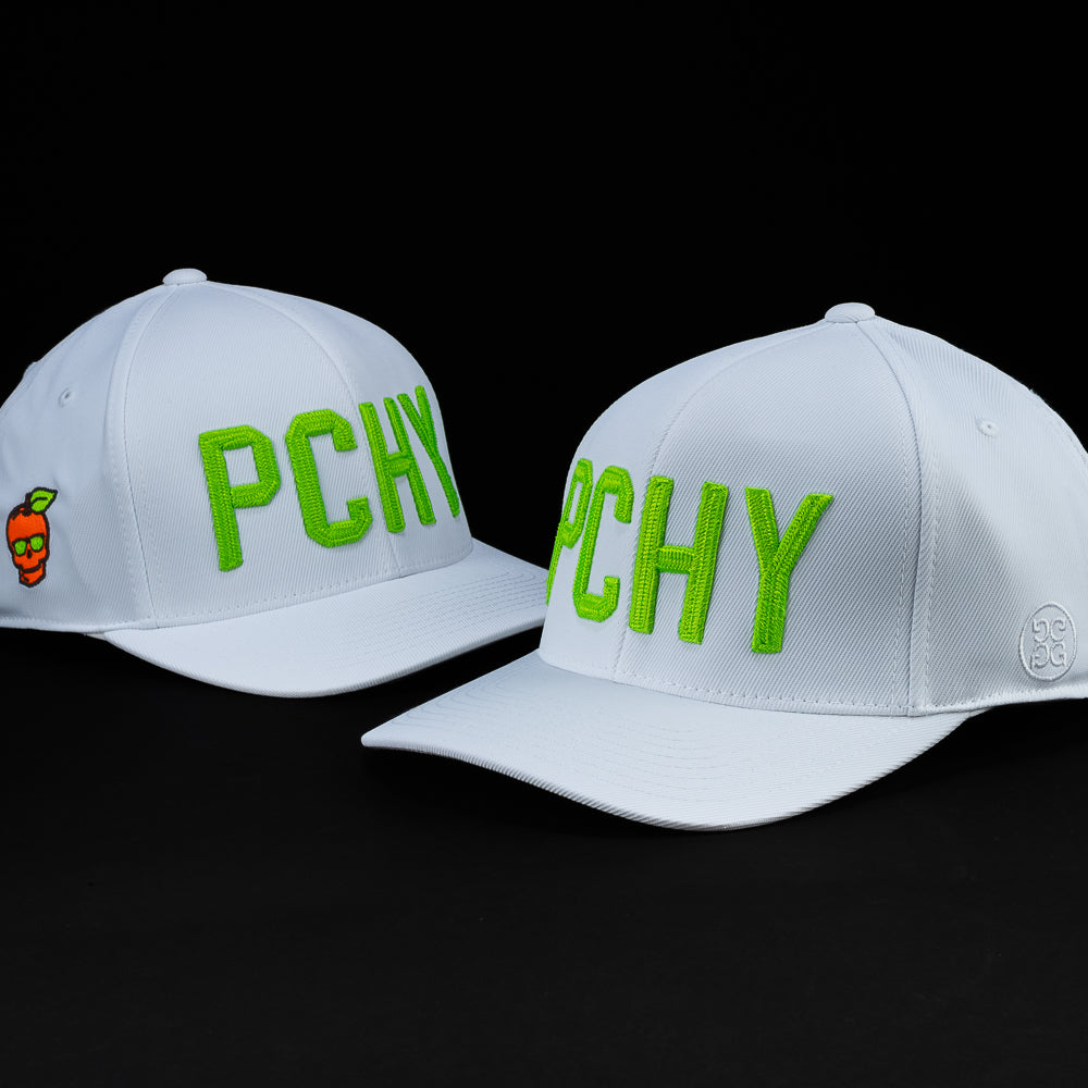 SWAG Golf x G/Fore Flexfit 110 white snapback golf hat with PCHY letters on the front.