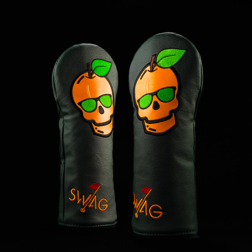 SWAG Golf peach skull dark green, orange, and neon green fairway wood golf headcover.