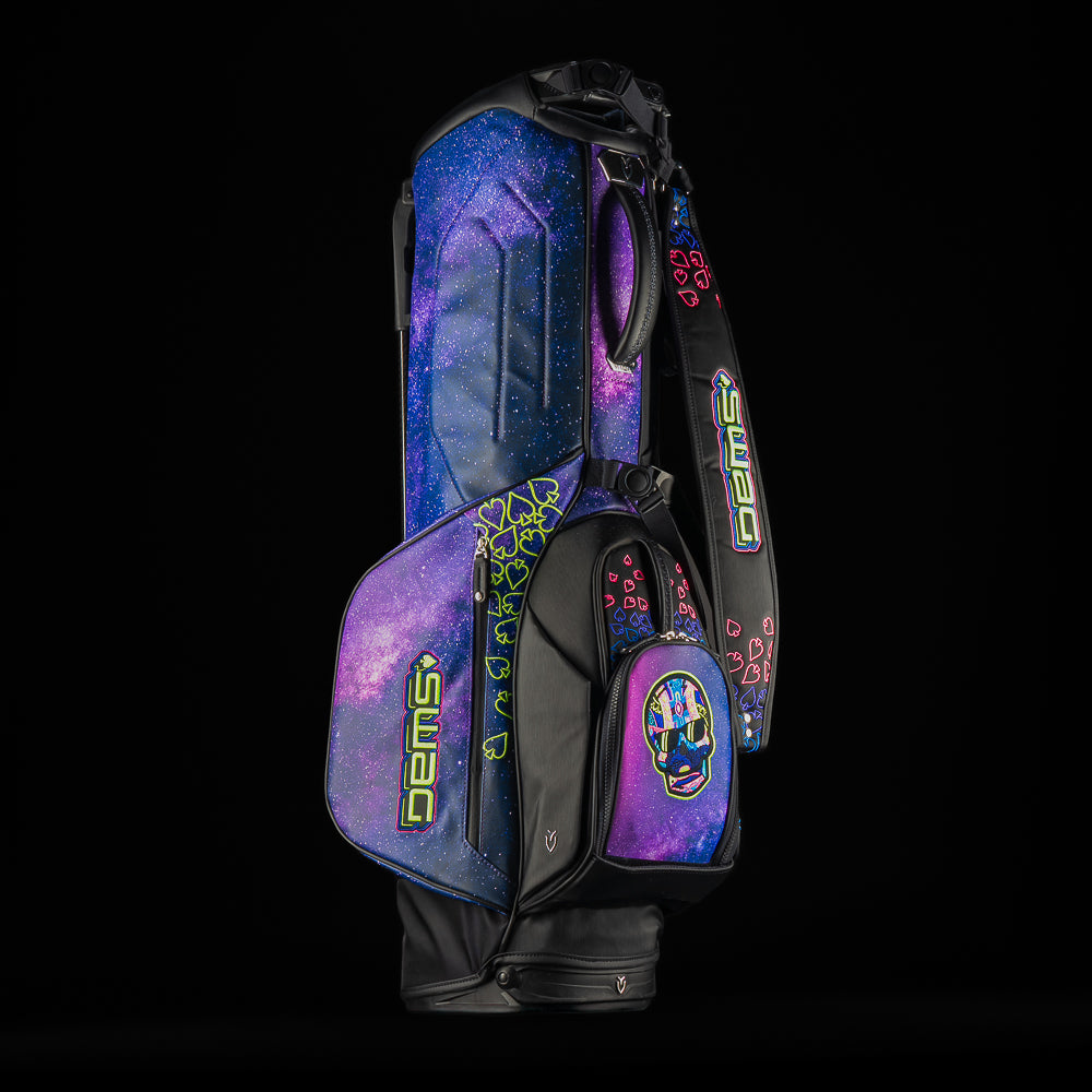 SWAG Golf x Vessel Lux Stand Bag with a purple and blue galaxy and playing card theme.