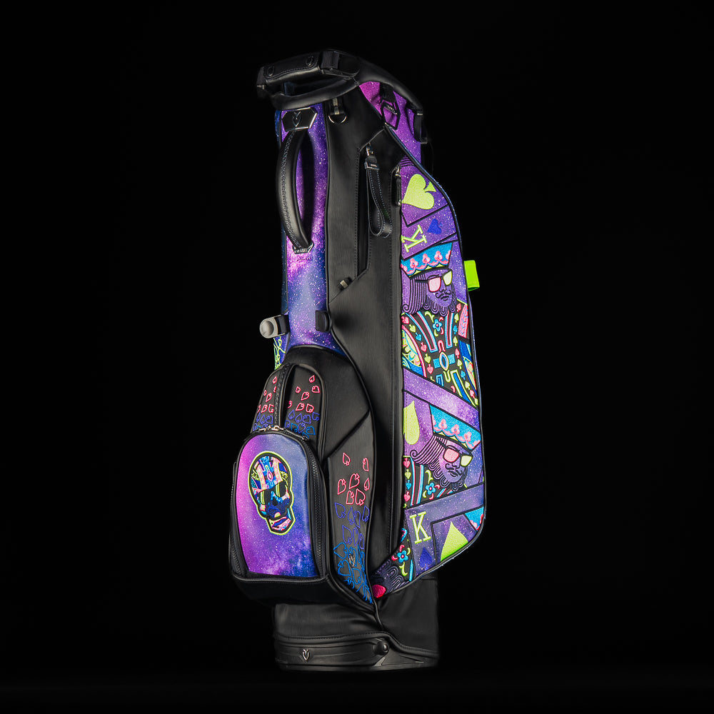 SWAG Golf x Vessel Lux Stand Bag with a purple and blue galaxy and playing card theme.