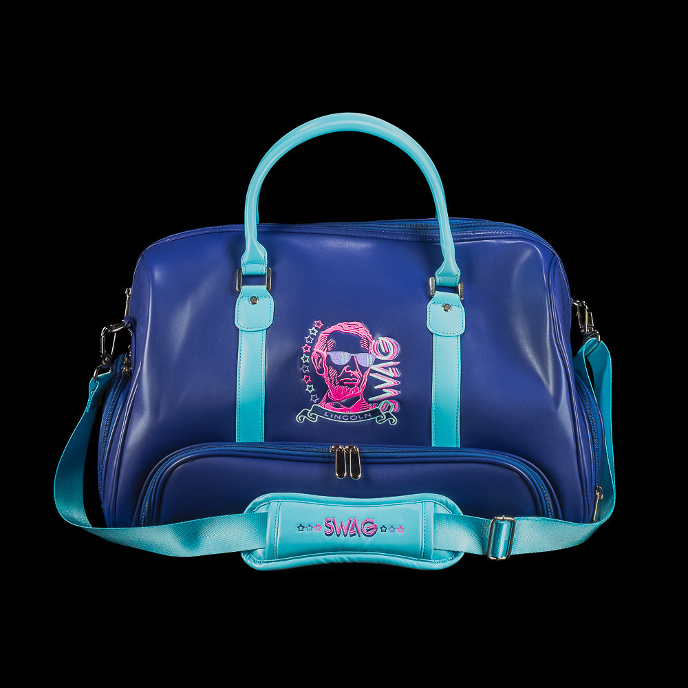 Blue duffel bag with teal handles and strap, featuring a graphic design of Lincoln and the SWAG logo on a black background.