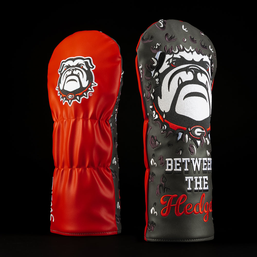 Red and black Georgia Bulldogs driver golf headcover featuring the bulldog mascot, oversized bulldog artwork and “Between the Hedges” lettering.