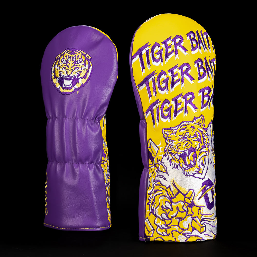 Purple and gold LSU driver golf headcover featuring the LSU tiger logo, repeating “Tiger Bait” lettering and an illustrated roaring tiger design.