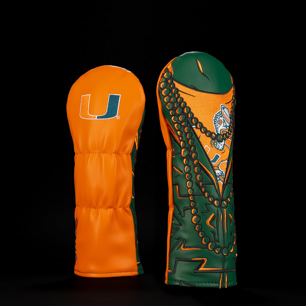 Orange and green Miami Hurricanes fairway golf headcover featuring the U logo and detailed mascot artwork wrapped in an intricate feather-inspired design.