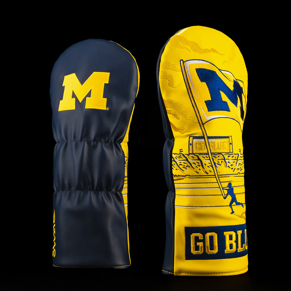 Navy and maize Michigan driver golf headcover featuring the Block M logo, Michigan flag artwork and bold “Go Blue” lettering.