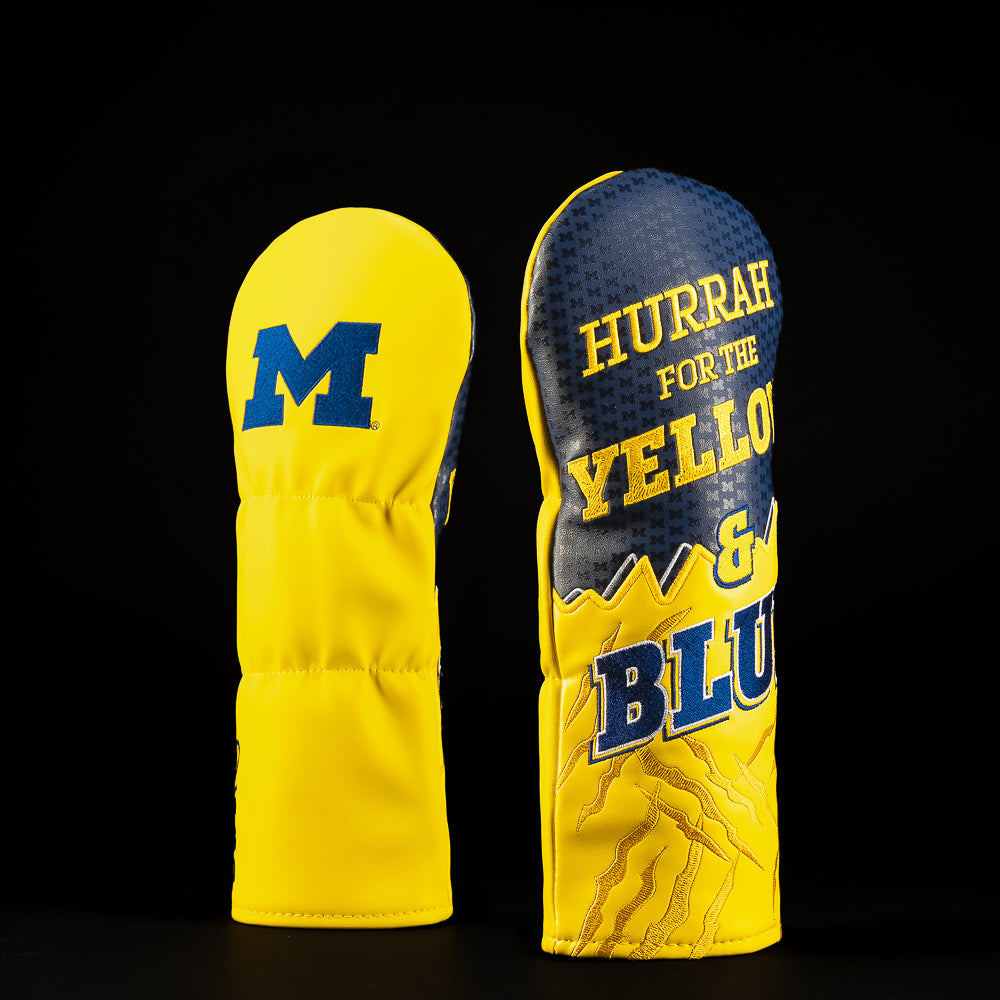 Maize and navy Michigan fairway golf headcover featuring the Block M logo and bold “Hurrah for the Yellow & Blue” typography with illustrated details.